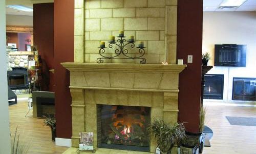 Escape 36 DV gas fireplace c/w cast mantle on display in our showroom