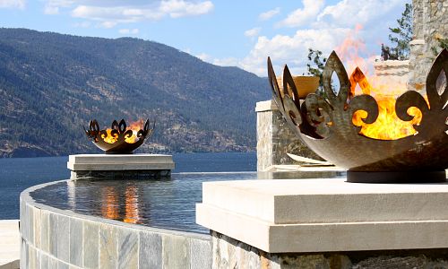 These twin custom fire inserts were installed into the fire bowls by Okanagan Fireplace Den in a estate home in Kelowna