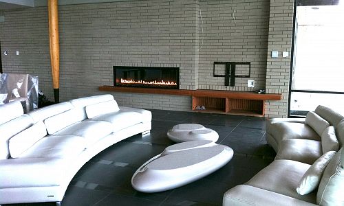 <p>This&nbsp;Linear modern 72&quot;&nbsp;Gas Fireplace was installed into a large open concept home in Kelowna British Columbia. The ribon of fire is streched out over a mahogany hearth. This fireplace and many others are available at Okanagan Fireplace Den.</p>