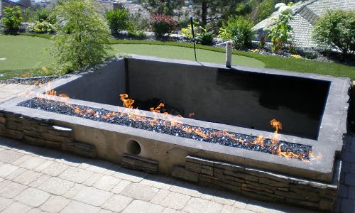 Another Okanagan Fireplace Den Custom Outdoor fire feature with fish pond